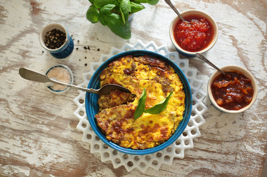 Delicious panfried beef mince loaded with traditional Cape Malay spices. We add raisins, apricots and toasted almonds, our delicious egg custard on top.